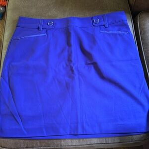 Vibrant purple golf skirt.